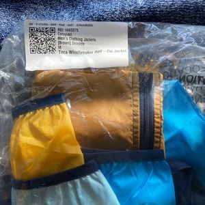 Cotopaxi windbreaker, brand new w/o tags.